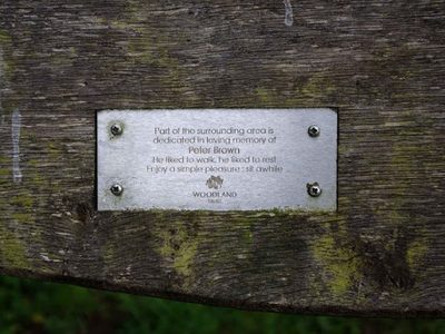 Plaque on seat by western edge of Bunkers Hill Wood, Staffs