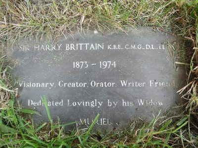 Sir Harry Brittain Plaque in All Saints Churchyard, Headley
