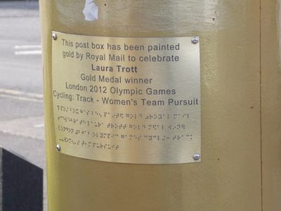 Cheshunt: one of Laura Trotts gold postbox plaques