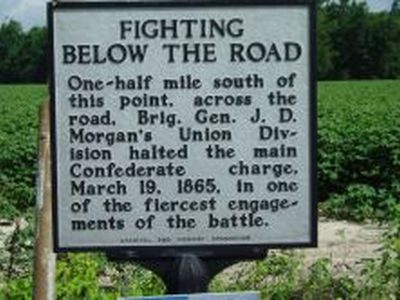 FIGHTING BELOW THE ROAD