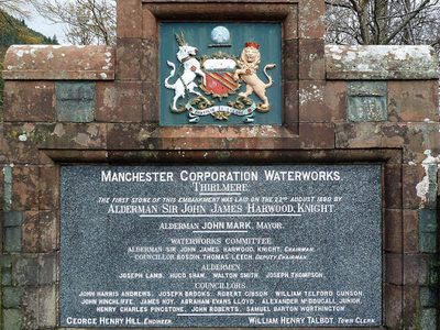 An inscription stone and plaque at Thirlmere Reservoir
