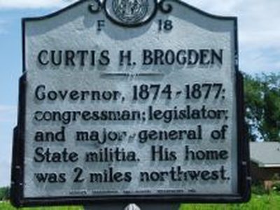 CURTIS H. BROGDEN