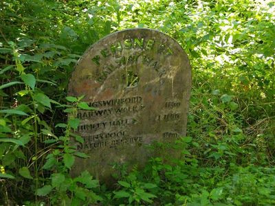 A plaque with distances on the Pensnett Railway Walk