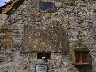 Bibury; National Trust  plaques on the last cottage in Arlington Row