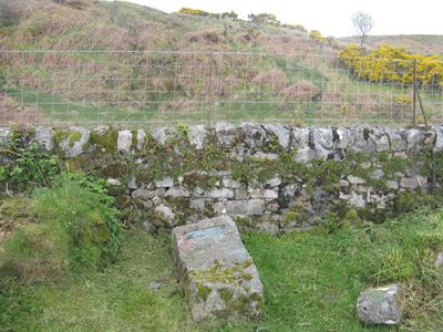 Memorial stone of "Gillouir MacCrain.....