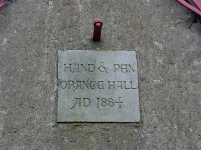Plaque, Hand & Pen Orange Hall