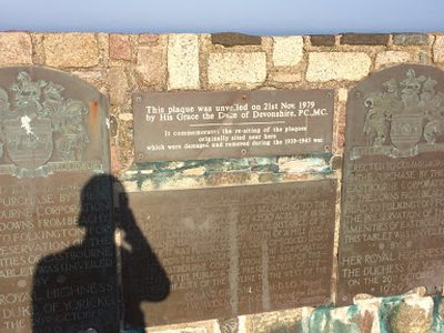 It Commemorates the Re-Siting of the Plaques Originally Sited Near Here