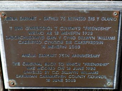 Plaque on a historic wooden buoy, Burry Port