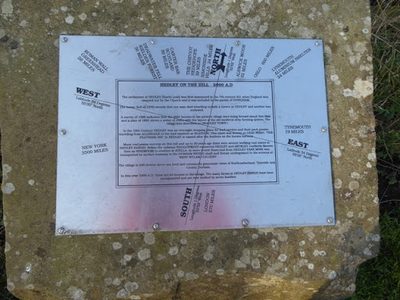 Interpretive panel and memorial plaque by the Millennium Stone, Hedley-on-the-Hill