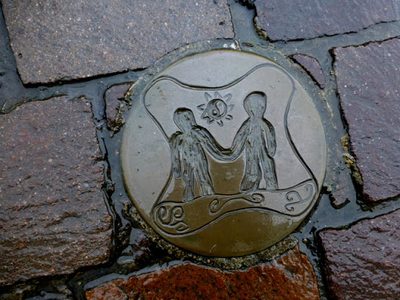 Circular brass plaque, Omagh