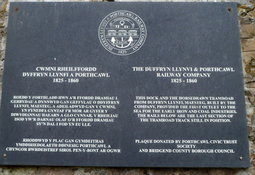Plaque behind a remnant of tramroad track, Porthcawl