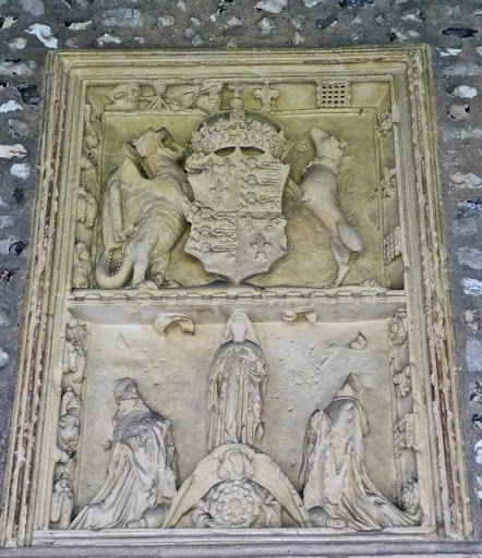 Royal Arms of Henry VII plaque in the cloisters
