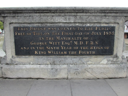 Plaque and a bench mark on St Mary's Street Bridge, Bedford