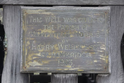 Plaque on the well