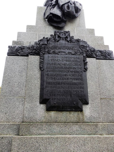 Bronze plaque on the plinth of Carnegie's statue in Pittencrieff Park