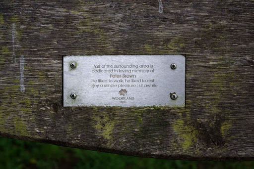 Plaque on seat by western edge of Bunkers Hill Wood, Staffs