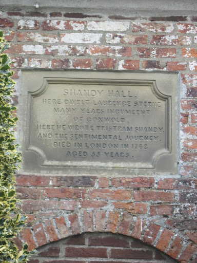 Plaque  over  front  door  of  Shandy  Hall