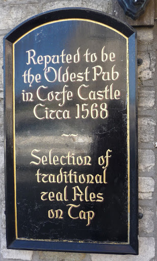 Sign outside Fox Inn, Corfe Castle, Dorset