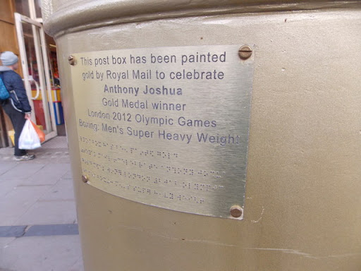 Watford: gold postbox plaque