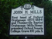 JOHN H. MILLS