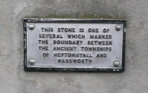 Plaque above township boundary stone