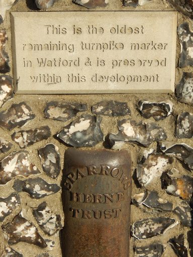 Sparrows Herne Trust marker, by Bushey Arches